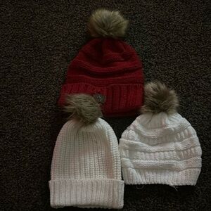 3 (2 white 1 red) winter hats